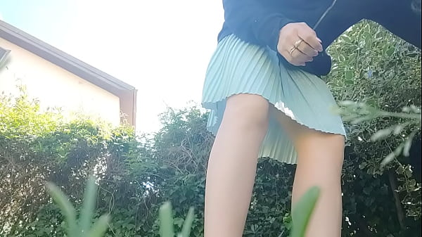 whore pissing and burping in the public park without underwear