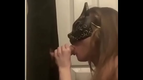 masked hotwife services a strangers big dick at her gloryhole