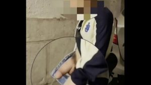 Amateur boy taking his fat cut cock out of his jeans and pissing in the street