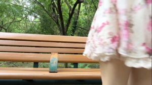 Asian girl masturbates on park bench and almost gets caught