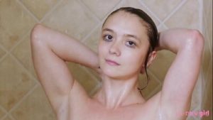 Charming brunette model took a shower