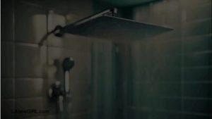 Elegant tall brunette took a shower