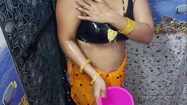 indian desi bhabhi bathing and removing her sexy saree
