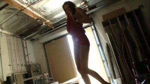 A sexy and shapely Latina in a mini bikini sits down on a really big black dick and rides it