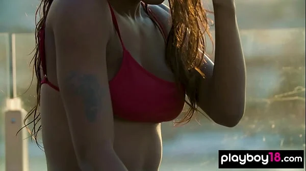 Smoking hot ebony teen Mimi Desuka stripping and unwinds on the rooftop