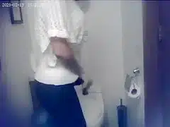 Lovely sweater on a cute woman going to the toilet