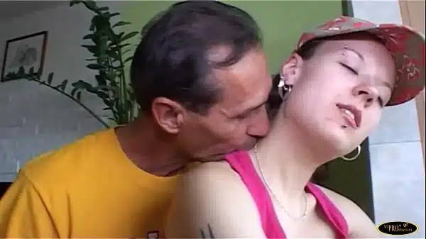 The older gentleman fucks the brunette girl while she does gymnastics on the exercise bike