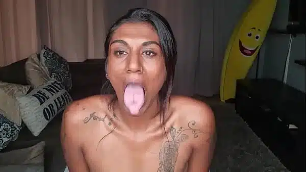 Sitting on the couch displaying my desi boobs, spit dripping down my tits as a constantly stick out my pink tongue